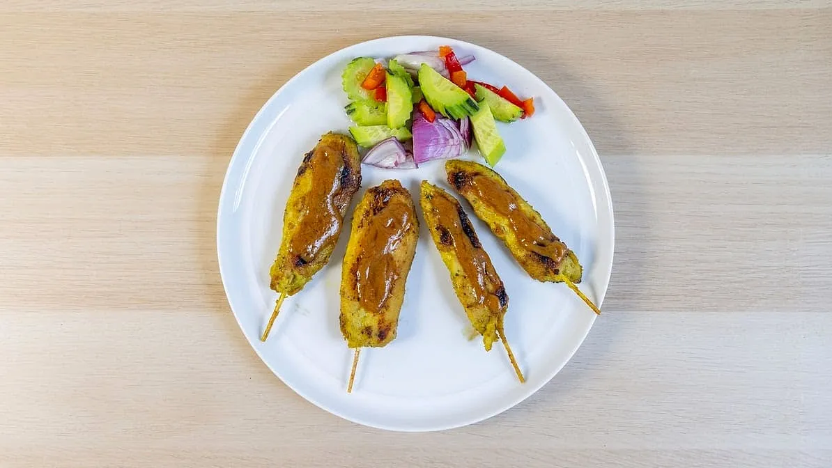 Chicken satay skewers with peanut sauce and cucumber relish at Sno Thai Cafe Madison